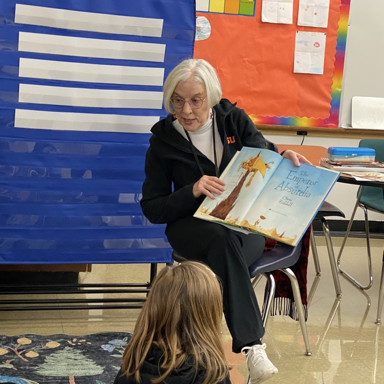 Readers reading to students