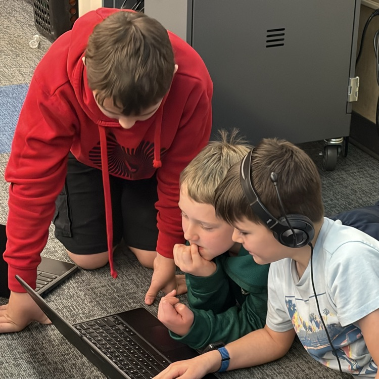 Students work on social skills project.