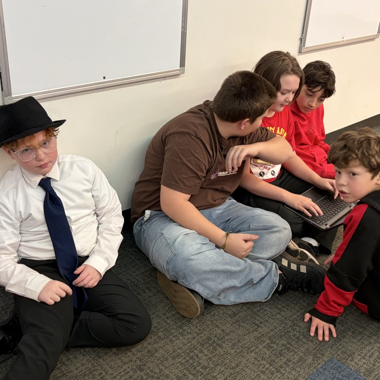 Students work on social skills project.