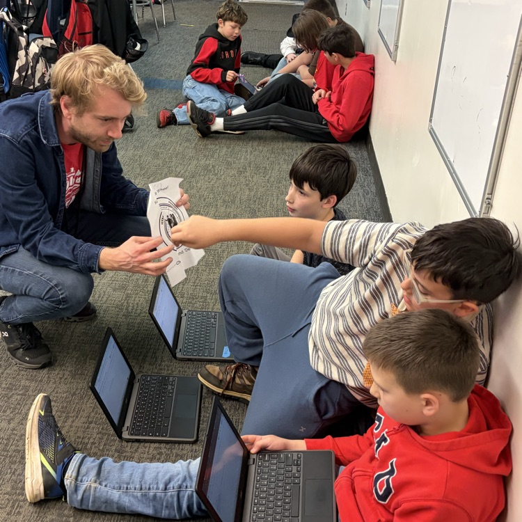 Students work on social skills project.