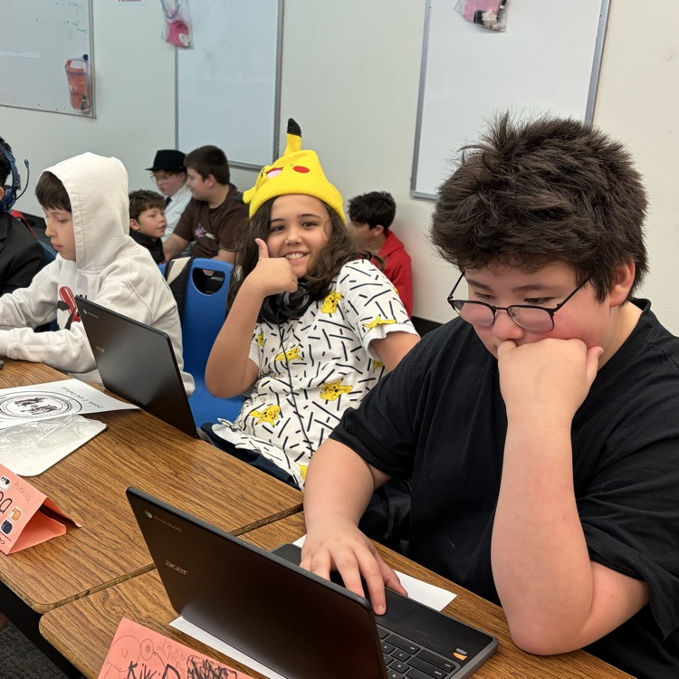 Students work on social skills project.