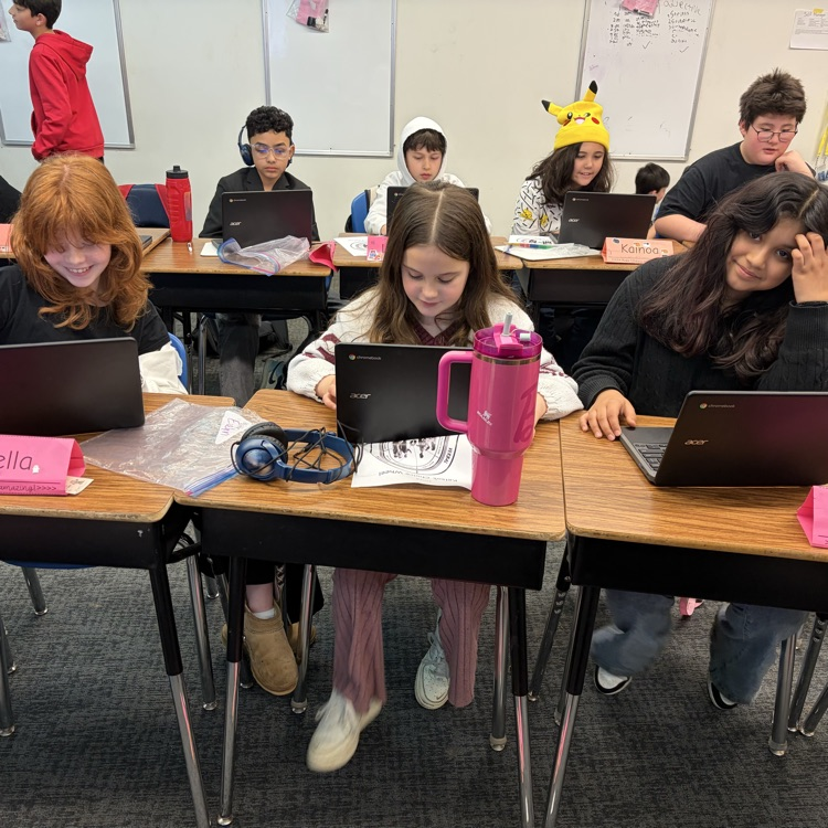 Students work on social skills project.