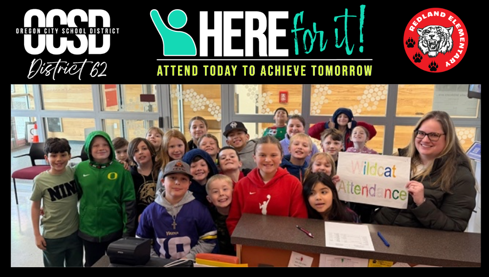 Class of students gathered around a front desk smiling and holding a sign that says Wildcat Attendance. 