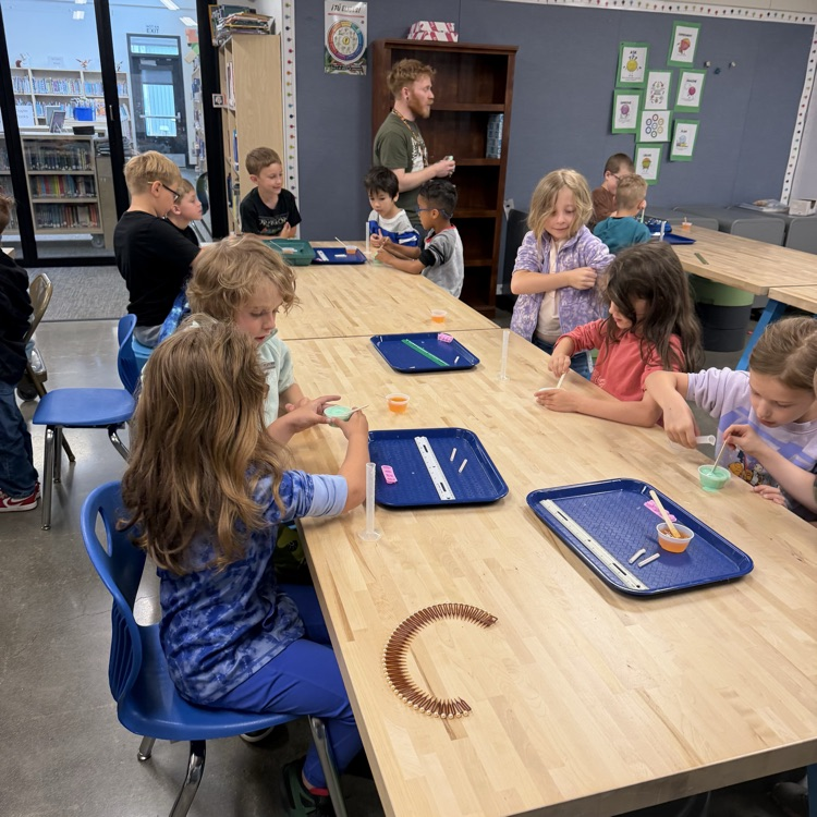 Students perform beginner chemistry.