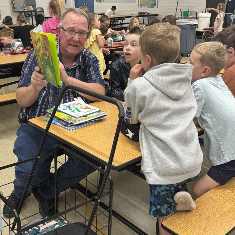 Mr. Howard reads to children .