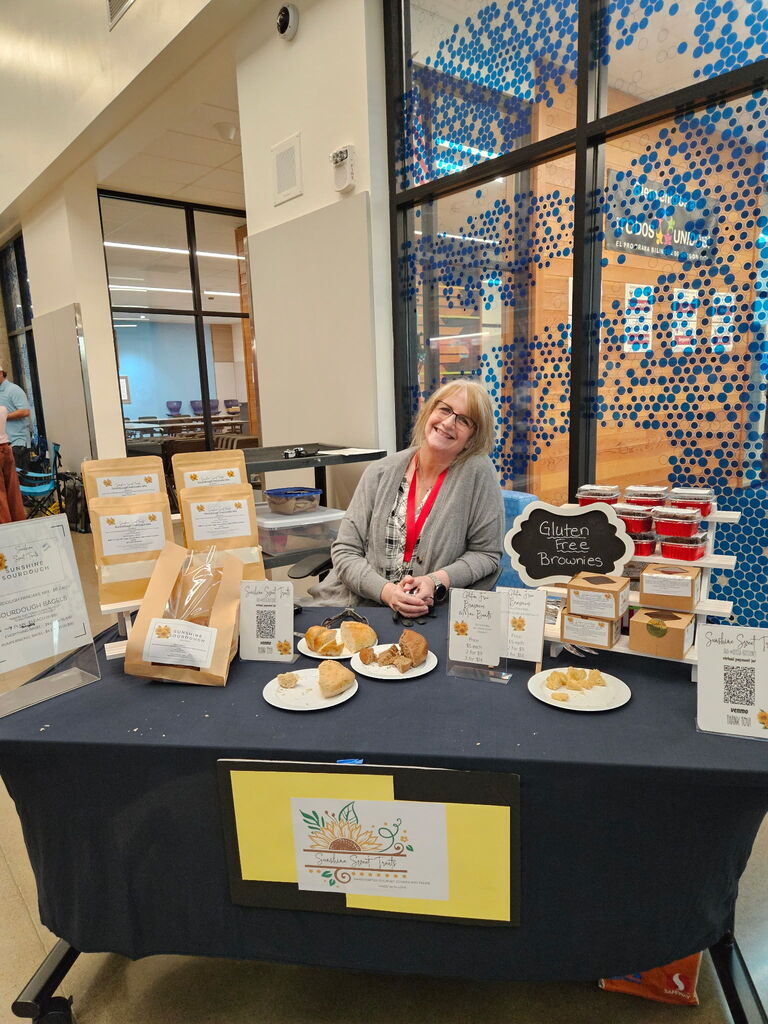 Staff member selling bagels