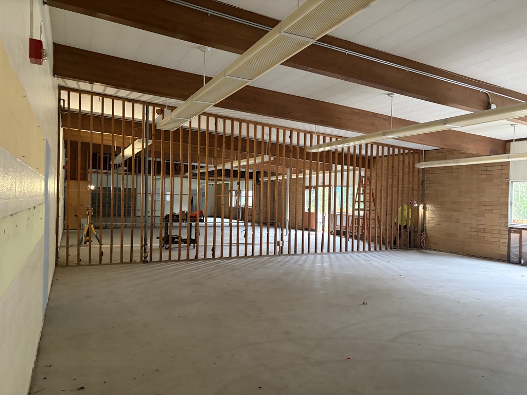 Room under construction showing a new wall being built.