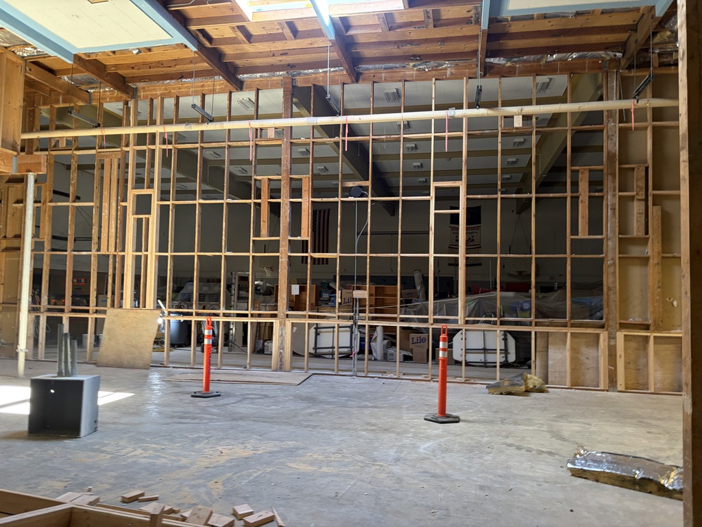 An empty room showing wood framing.