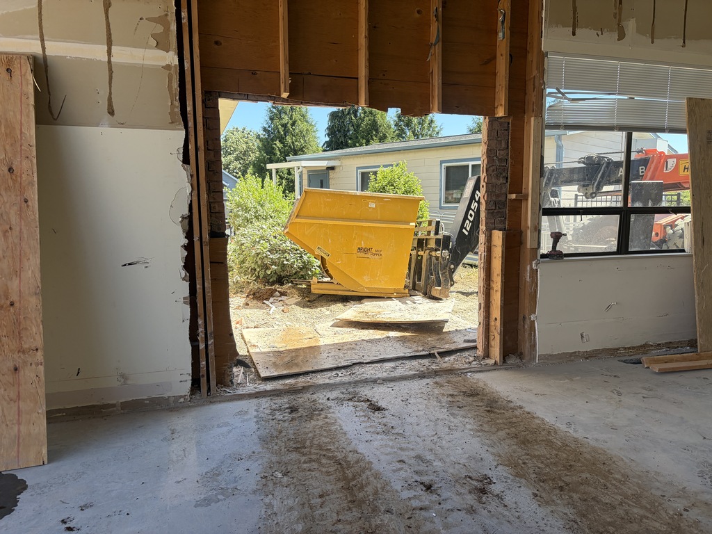 A hole in the wall where a new exit out of the building will be going in.