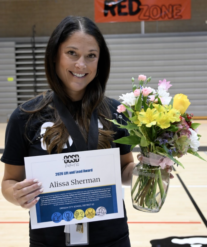 Alissa with award certificate and flowers