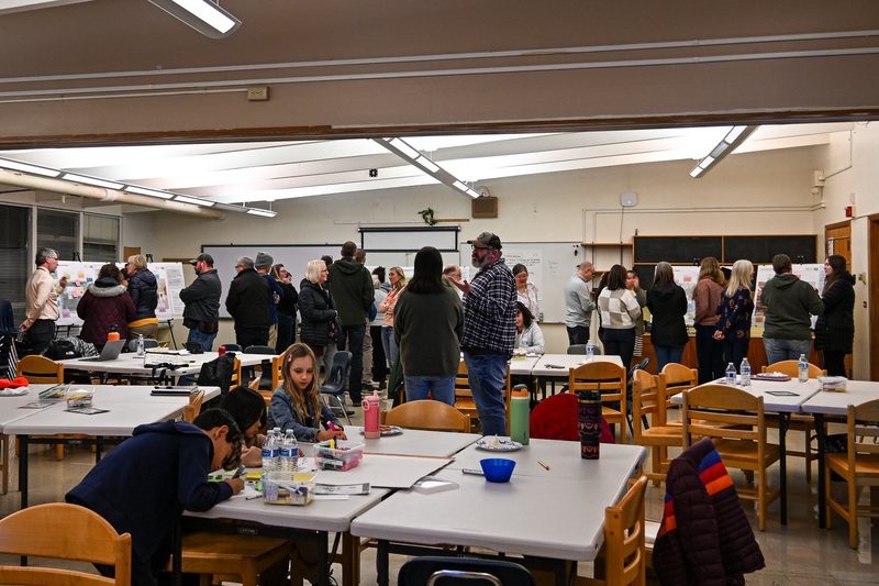 EDAG members reviewing and discussing conceptual designs