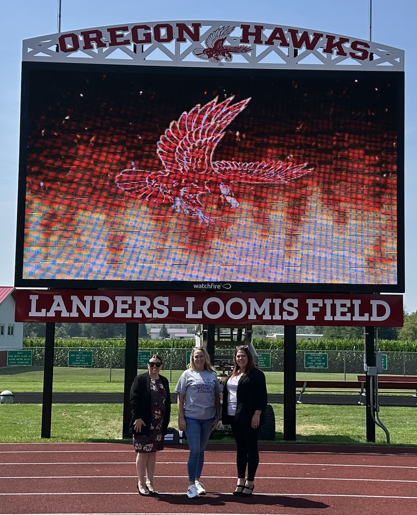 Scoreboard with Sterling Federal Bank and OCUSD Representatives