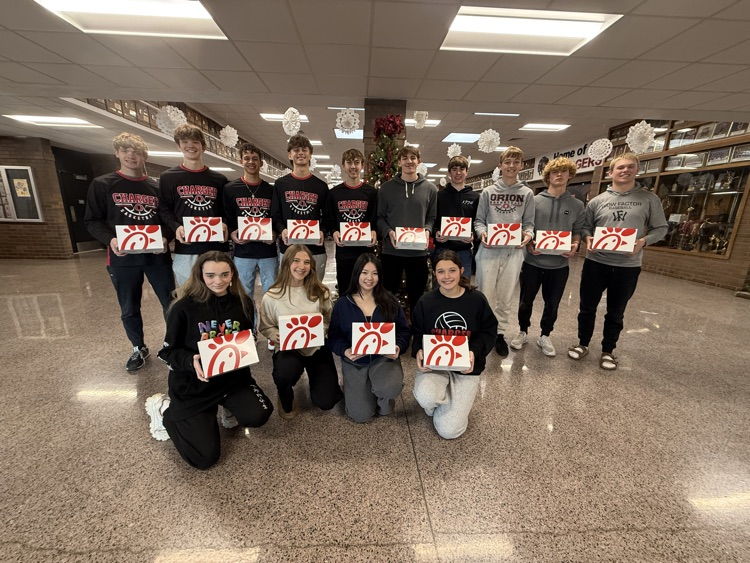 kids with chick fil a boxes