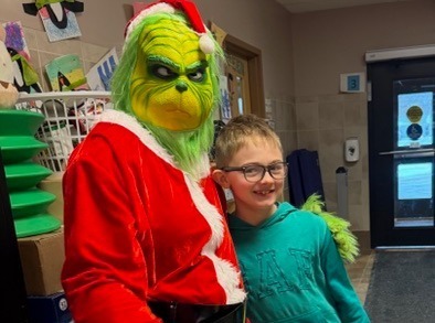 Student with the Grinch