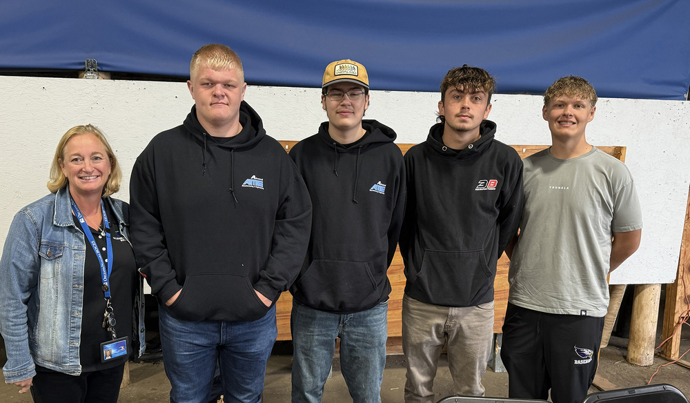 Principal Standing with Group of Students