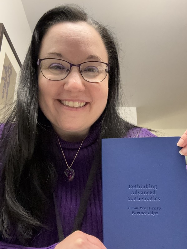 Photo of Jennifer with book