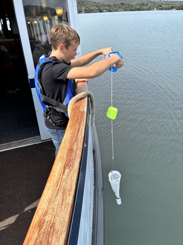 5th grade boy using a fishing device on the Northern Star