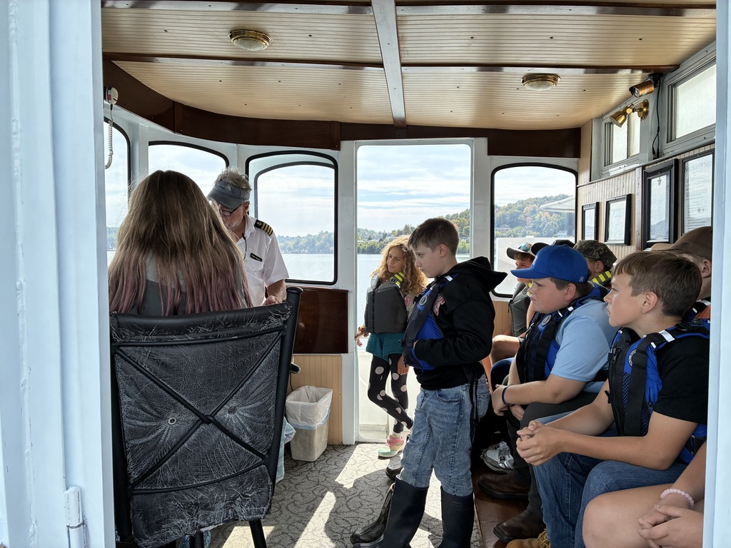 5th grade students listen to Captain Robbie on the Northern Star