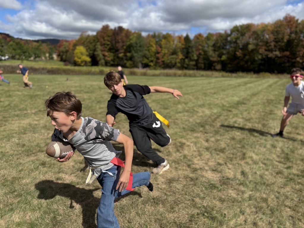students playing flag football