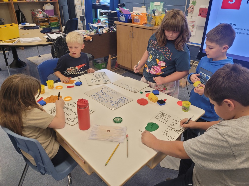 students doing small group math activities