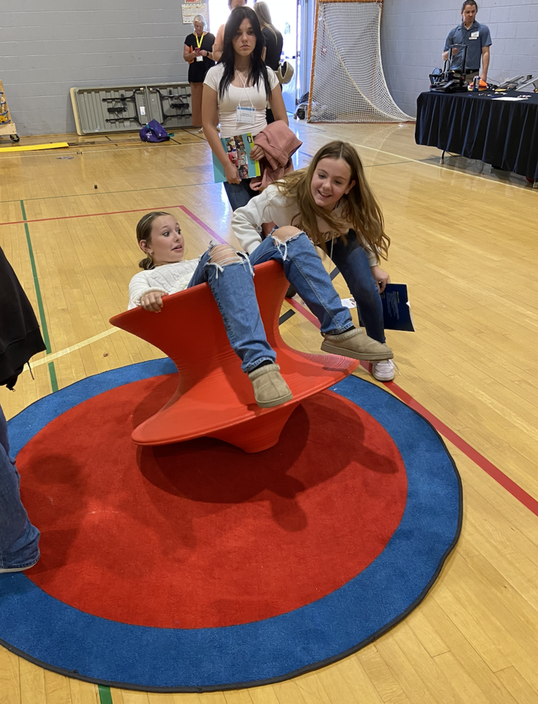 Students attending a STEM and career field engaging in activities