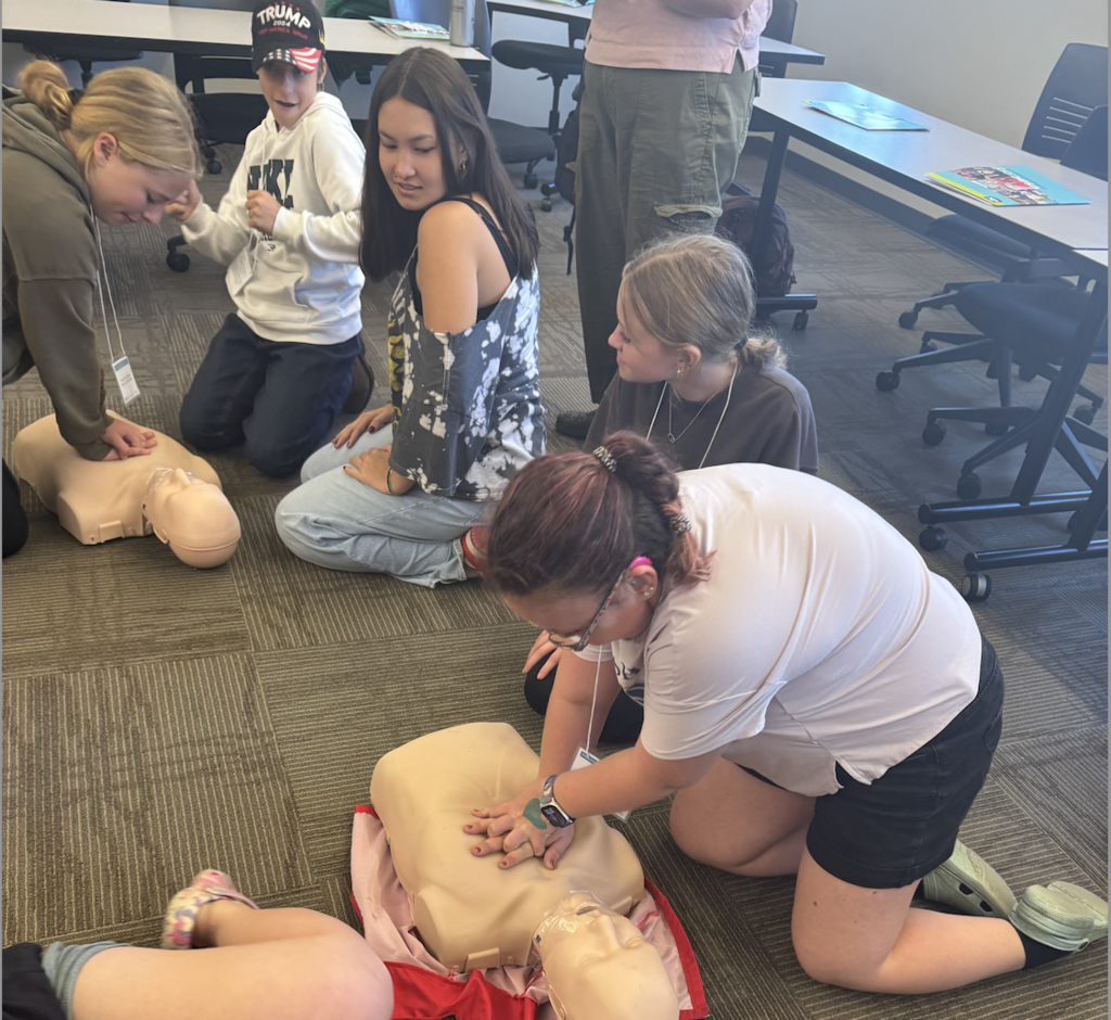 Students attending a STEM and career field engaging in activities
