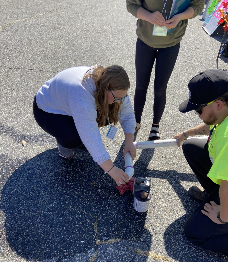 Students attending a STEM and career field engaging in activities