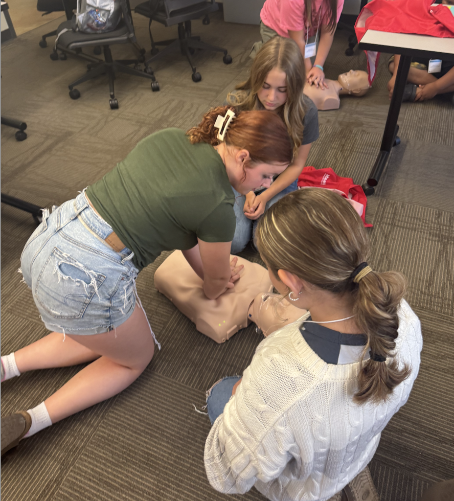 Students attending a STEM and career field engaging in activities