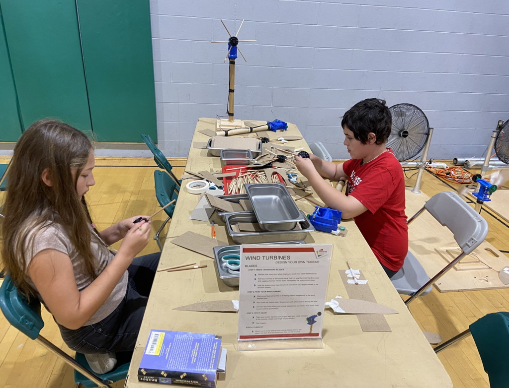 Students attending a STEM and career field engaging in activities