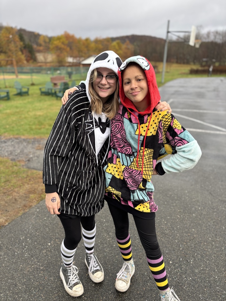 Two 8th grade girls dressed as the main characters from the Nightmare Before Christmas