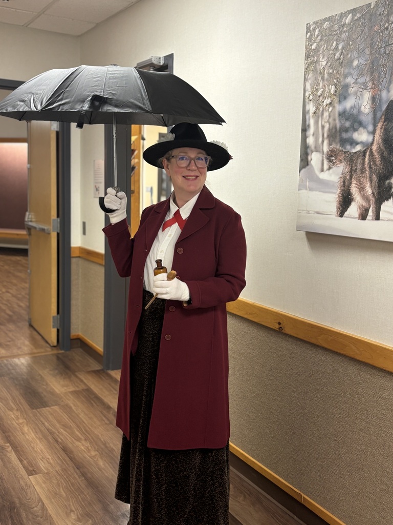 Ms. Wendy dressed and posing as Mary Poppins