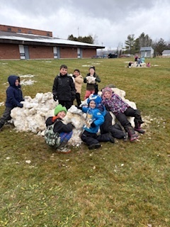 kids with giant snowball