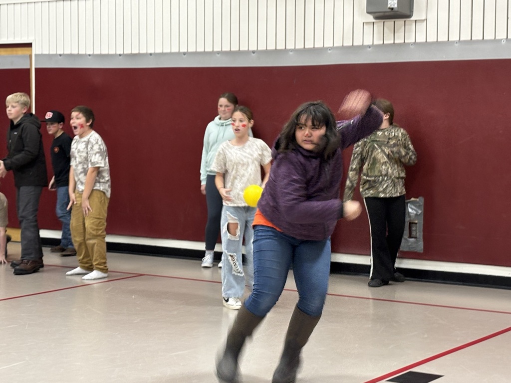 6th grade students competing in dodgeball