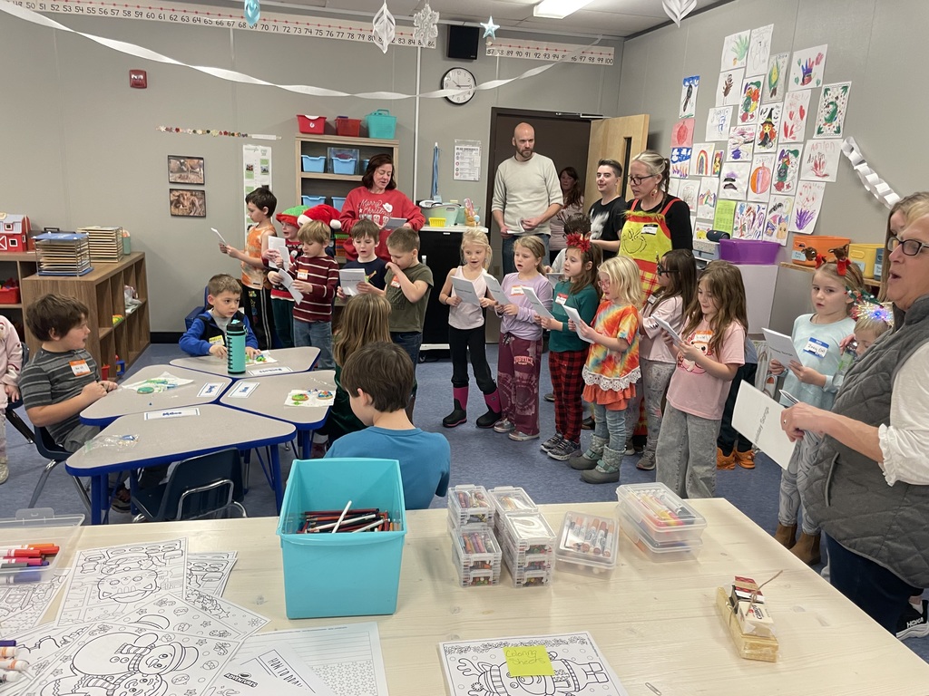 students holiday caroling 