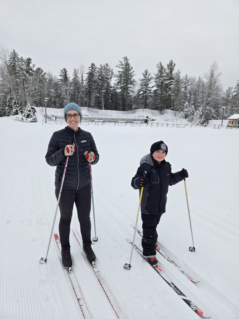 student and staff cross country skiing 