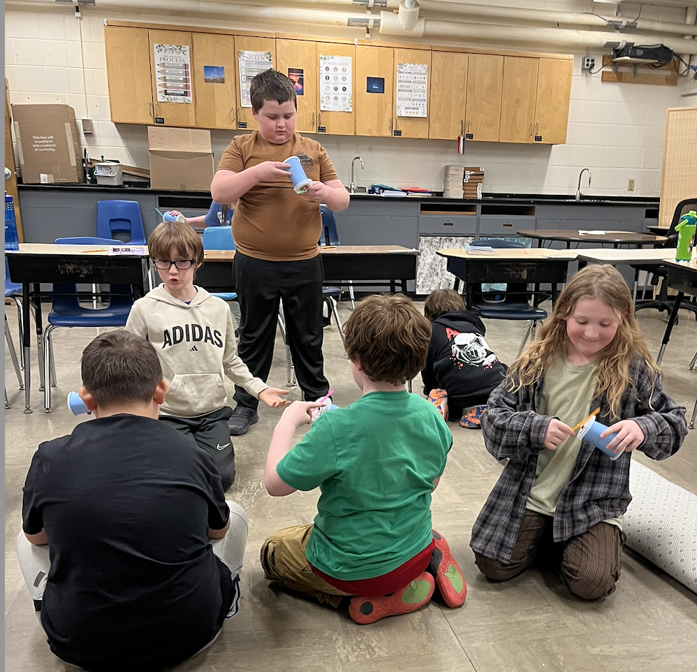 students in science preparing their 'cars'