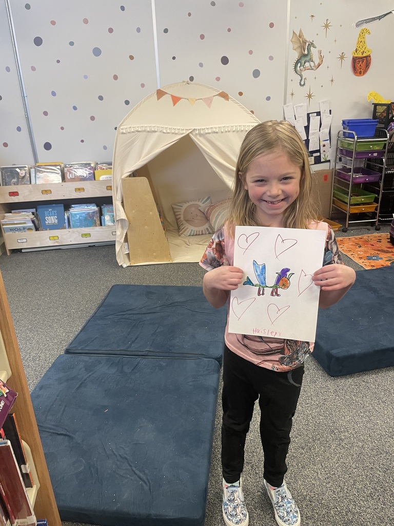 student finished coloring in Library 