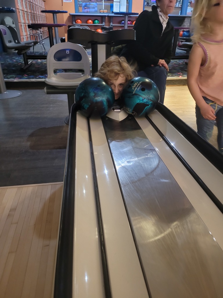 student bowling for winter activities 