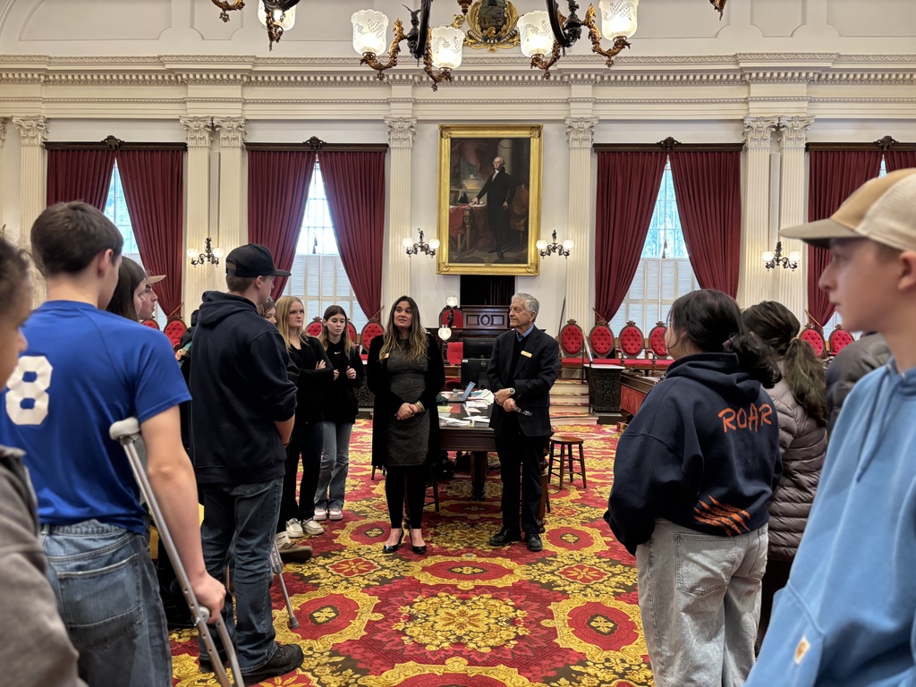 8th grade chatting with Representative  Leanne Harple 