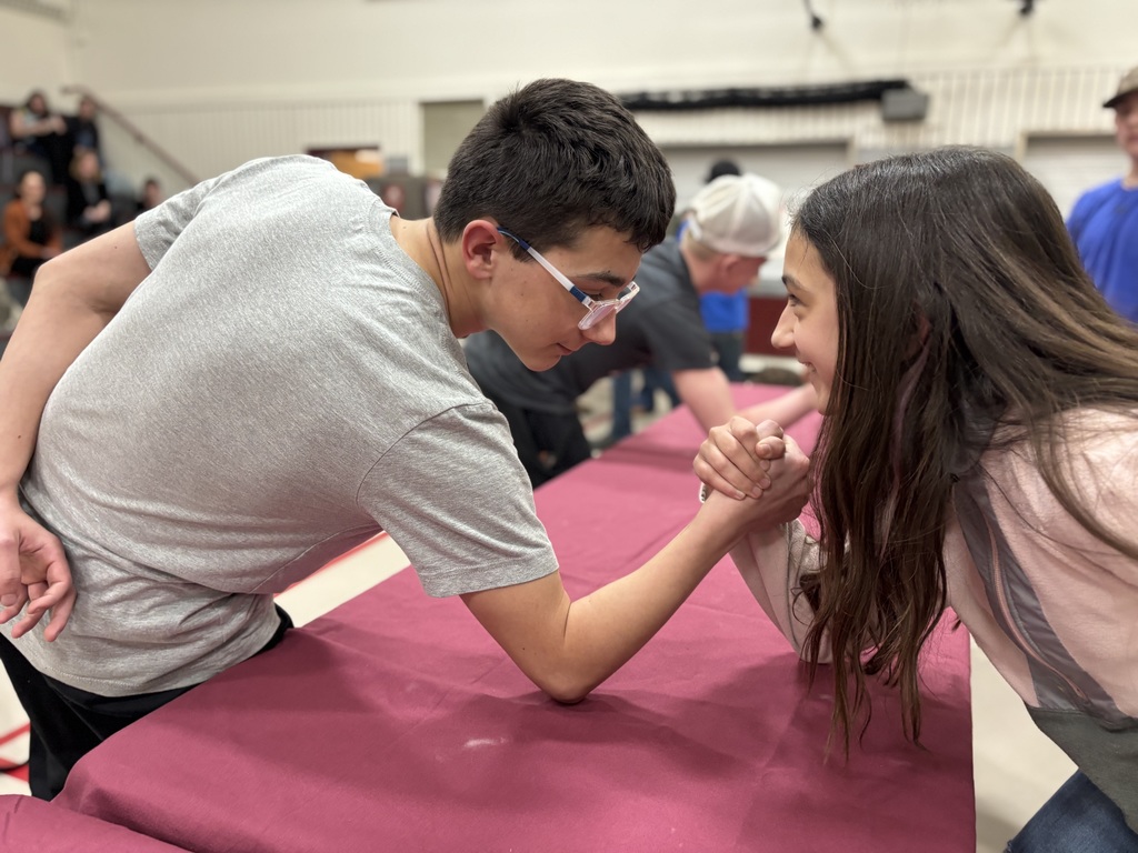 brother vs. sister arm wrestling 