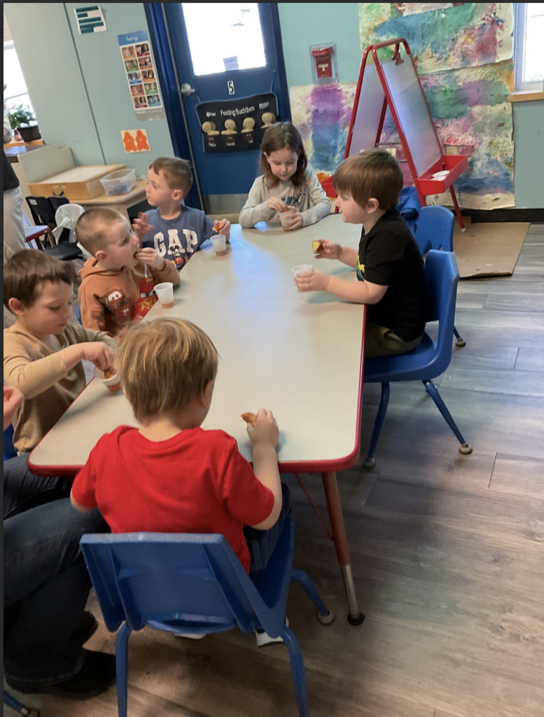 Tasting syrup and donuts!