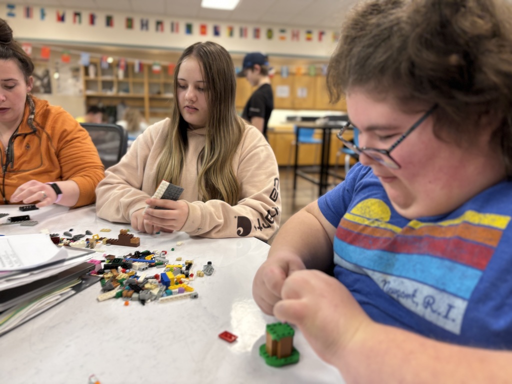 Two 7th grade girls work on recreating the Harrapan Civilization out of legos in Social Studies 