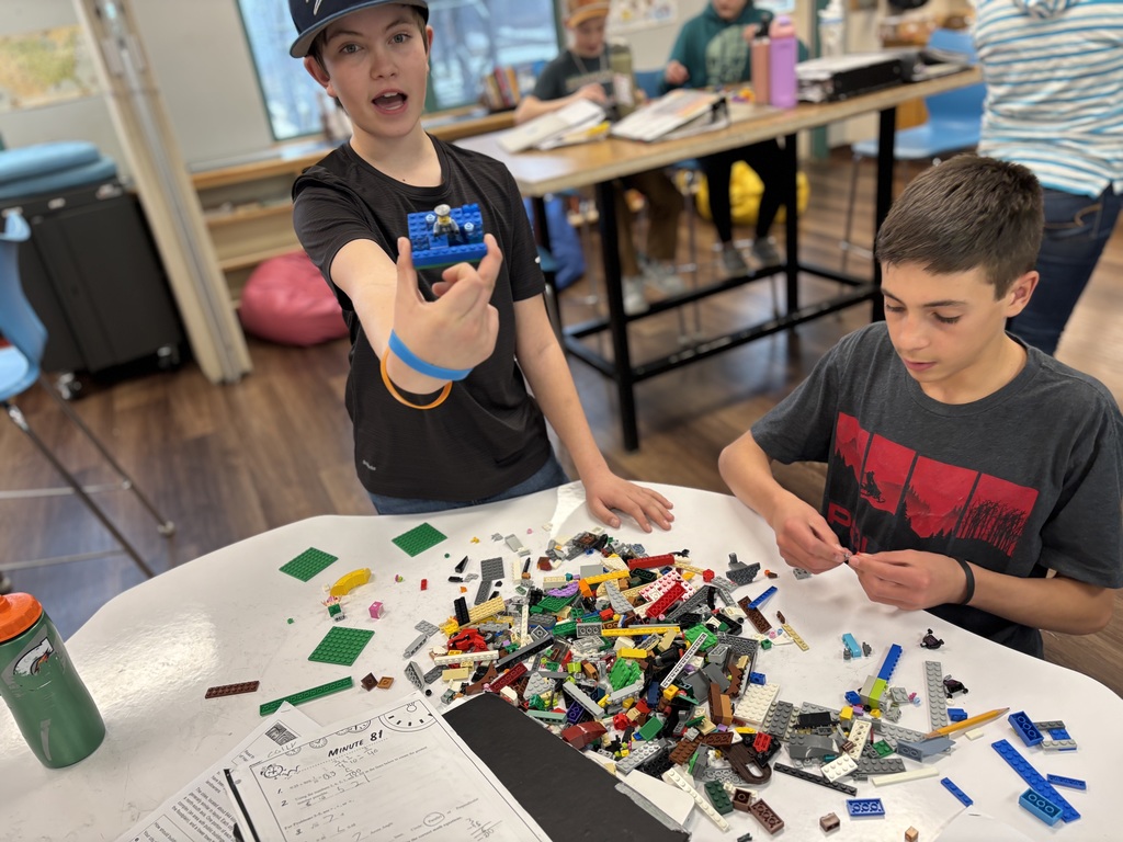 Two 7th grade boys work on recreating the Harrapan Civilization out of legos in Social Studies 