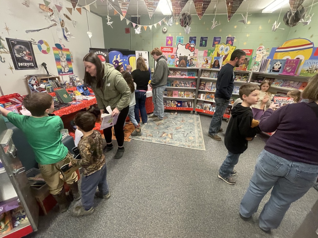 students and families at the Scholastic Book Fair 