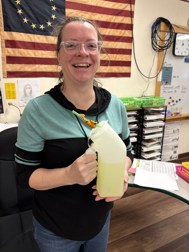 Ms. Zoe holds a medical device as a waterbottle