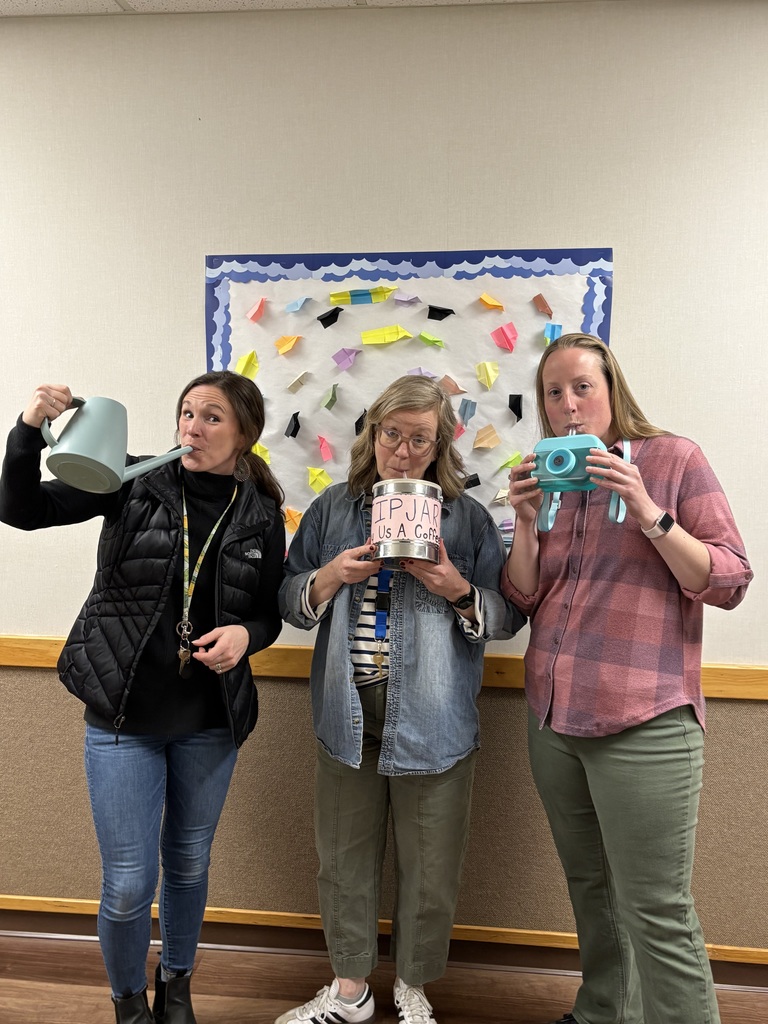 Ms. Angelee, Ms. Wendy, and Ms. Thomas are holding a watering can, a coffee can, and water bottle shaped like a camera.