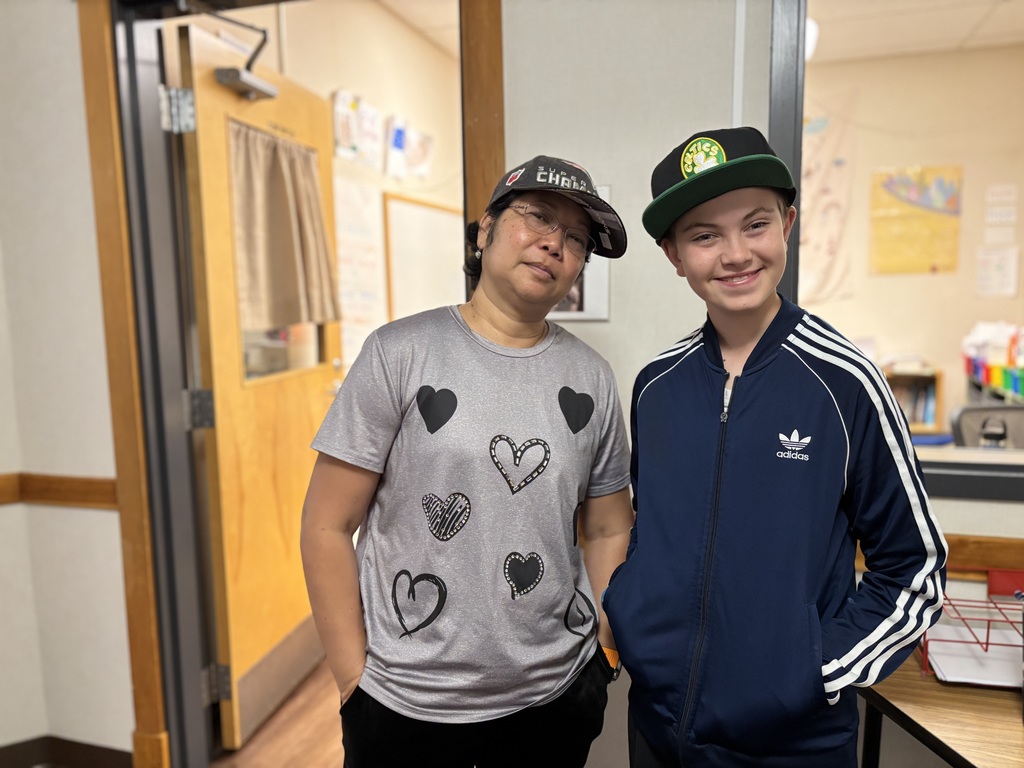 Ms. Phun posing with the 7th grade boy she dressed as.