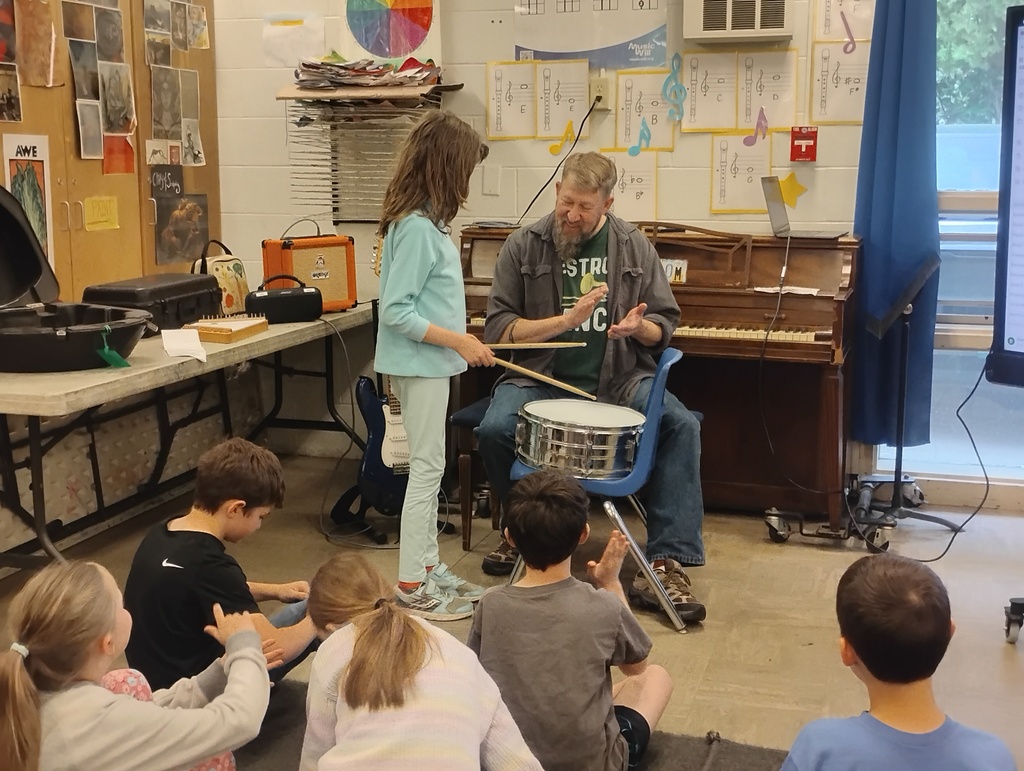 students playing drum in music