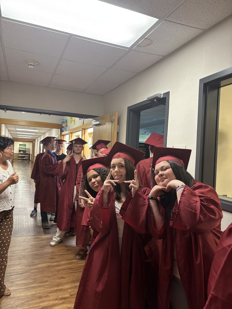 8th graders posing for the camera before the walk in.