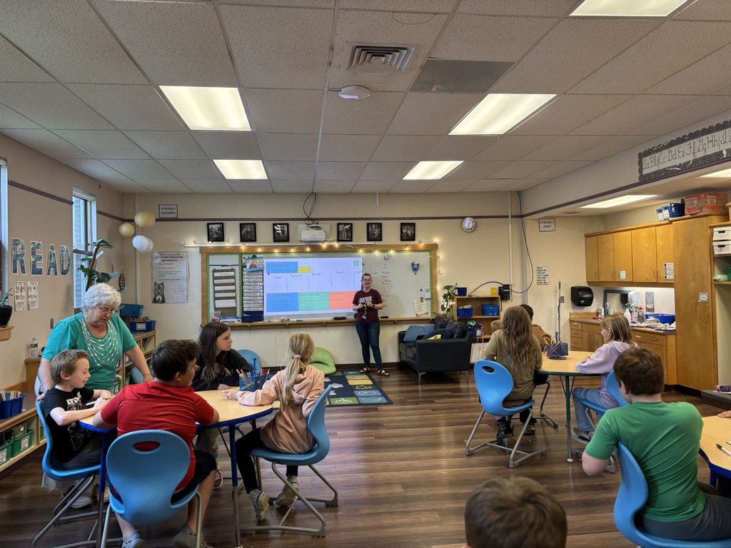 Ms. Collier running a writing game with rising 5th graders for step-up day!